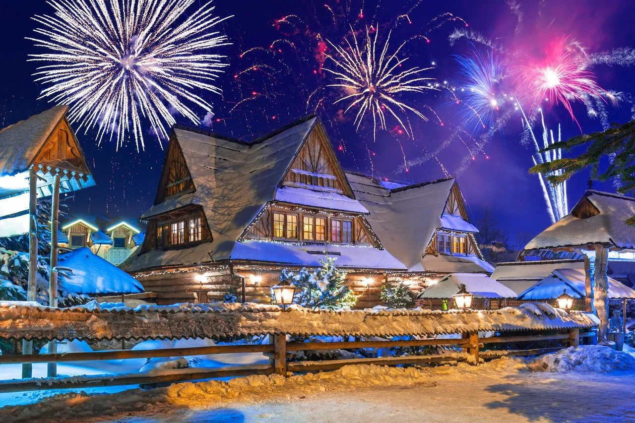 New Years firework display in Zakopane at snowy night, Poland