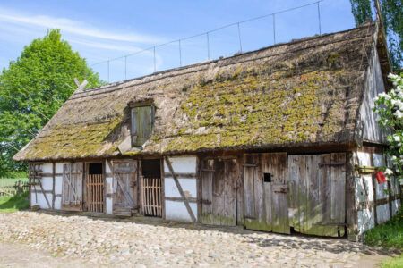 Traditional old polish countryside wooden thatched houses and farmyards