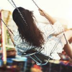A group of friends is enjoying the amusement park