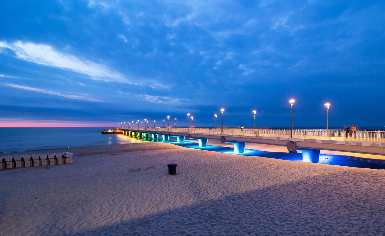 Colorful pier lights in the evening, Baltic Sea, Kolobrzeg, Poland