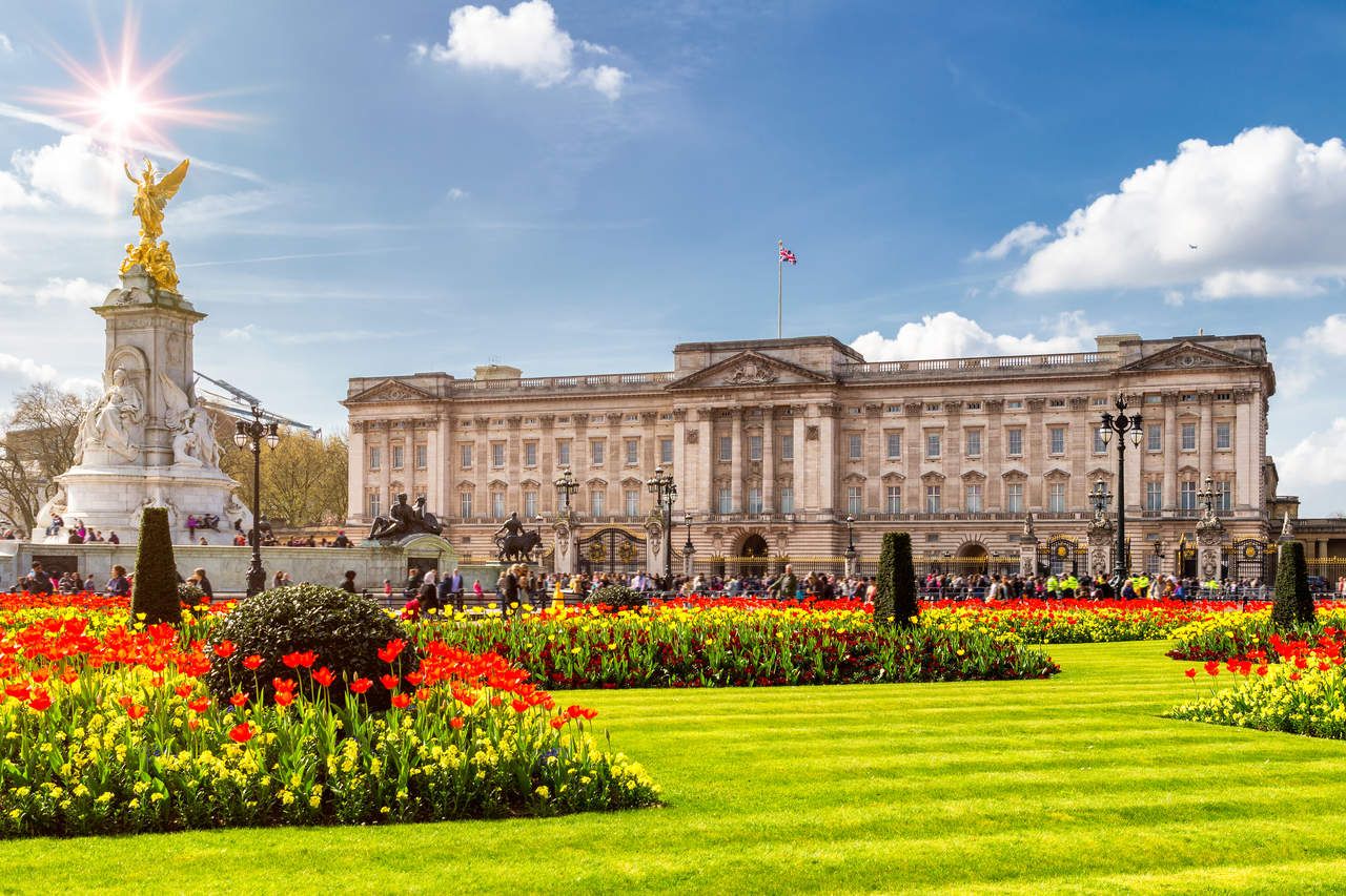 Gardens of Buckingham Palace in sunny day in London, United Kingdom