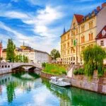 Slovenia Ljubljana Tromostovje Ljublianica river Church