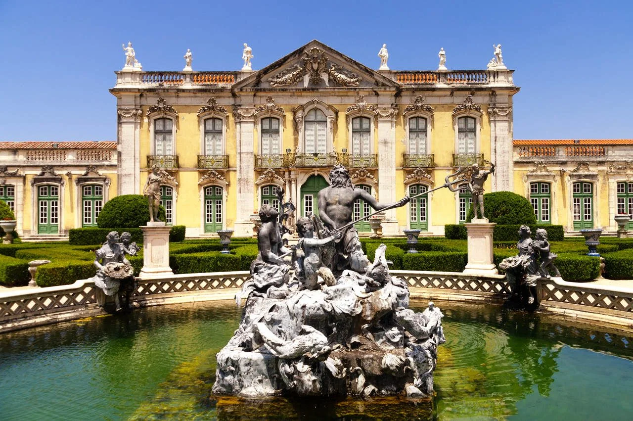 Facade of Queluz National Palace, and Neptune fountain in Sintra