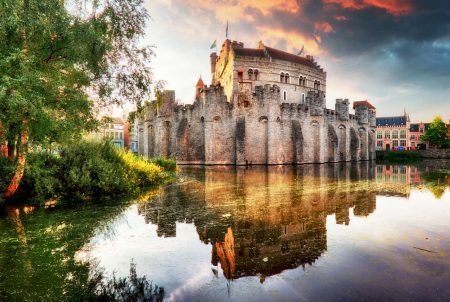 Ghent – Castle Gravensteen at dramatic sunrise