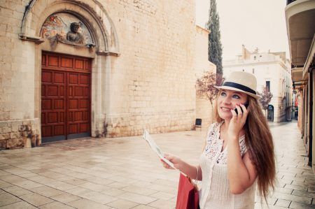 Girl is walking on the tourist city of Spain, Figueres