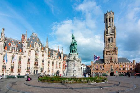 Market square (Grote markt) and Belfort tower in Bruges, Belgium