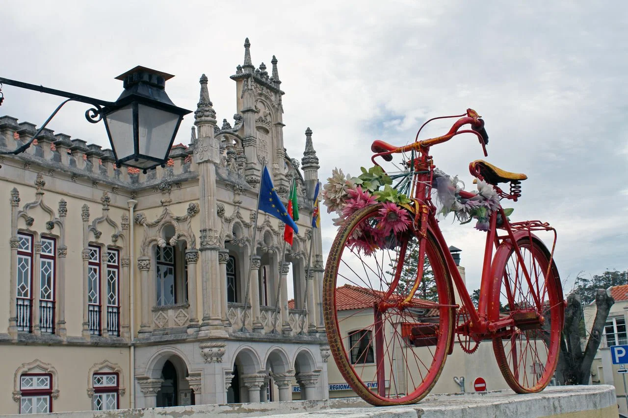 Old style bright red bicycle on display, Sintra