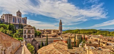 View of the medieval city of Girona with the Cathedral of St. Mary and the Church of St. Feliu. Girona, Catalonia, Spain.