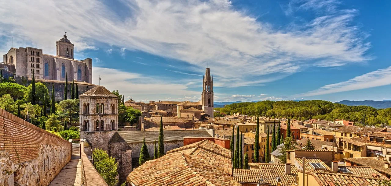 View of the medieval city of Girona with the Cathedral of St. Mary and the Church of St. Feliu. Girona, Catalonia, Spain.