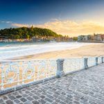 Nice beach with the old town of San Sebastian, Spain in the morning