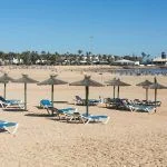 Sun lounger on the beach of Caleta de Fuste, Canary Island Fuerteventura, Spain