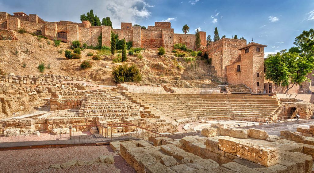View of the ancient Roman amphitheater and the Alcazaba fortress in Malaga