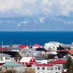 Beautiful view of Keflavik with mountains and water on a background