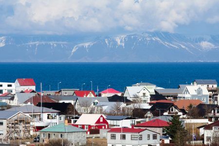 Beautiful view of Keflavik with mountains and water on a background