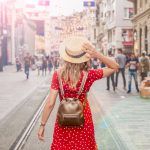 Beautiful woman stands at Istiklal street,a popular location in Beyoglu district,Istanbul,Turkey
