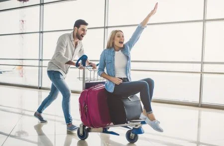 Excited travelers at the airport