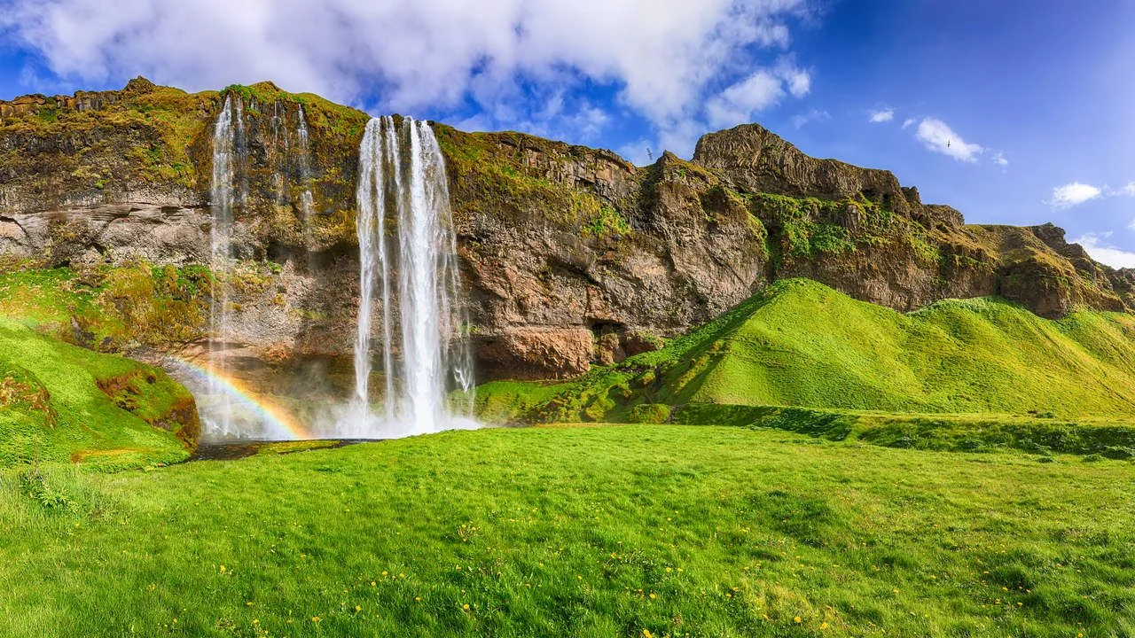 Fantastic Seljalandsfoss waterfall in Iceland during sunny day. Location Seljalandsfoss waterfall, part of the river Seljalandsa, Iceland, Europe