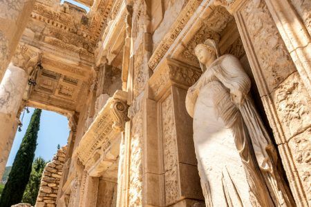 Library of Celsus in the ancient city of Ephesus, a UNESCO World Heritage site in Izmir, Turkey, closed up details with female marble statue representing virtue (Arete)