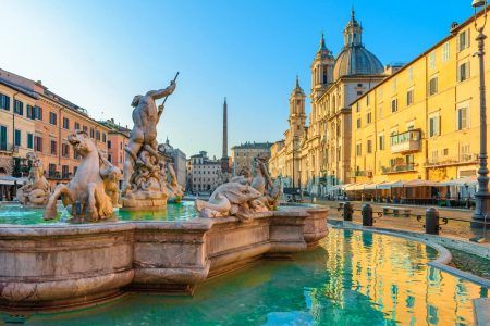 Navona Square or Piazza Navona in Rome, Italy with fountain. Rome architecture and landmark at sunrise with nobody