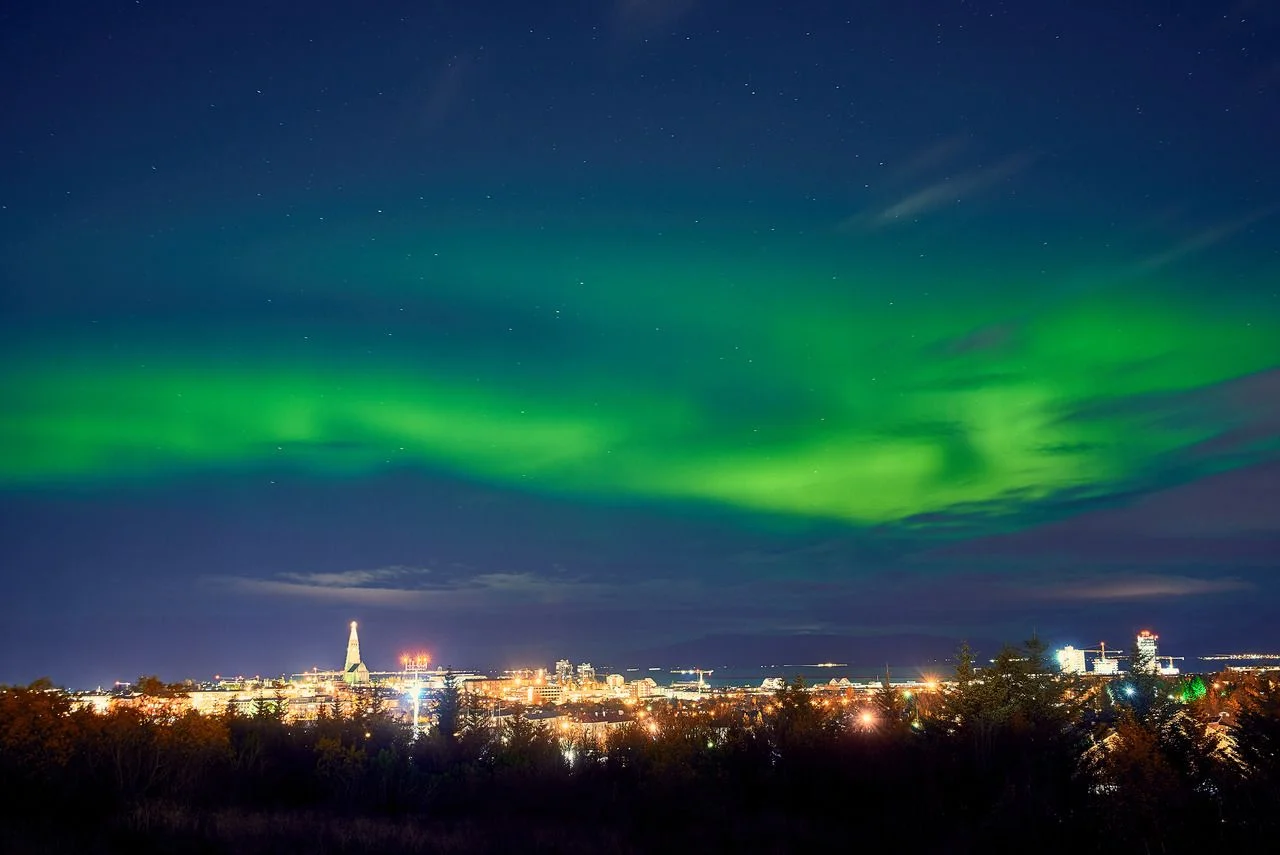 Northern lights above Reykjavik in Iceland at night