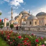 Sehzade Mosque or Prince Mosque at sunset with flowers in Istanbul, Fatih
