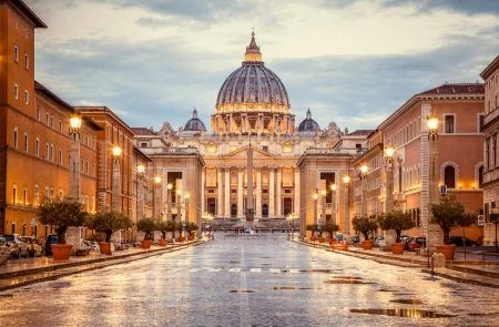 St. Peter’s Basilica in the evening from Via della Conciliazione in Rome. Vatican Rome Italy.