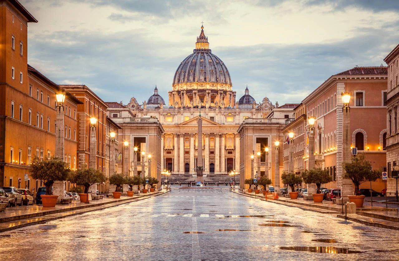 St. Peter’s Basilica in the evening from Via della Conciliazione in Rome. Vatican Rome Italy.