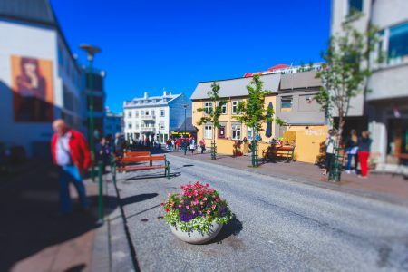 Street scene street in downtown Reykjavik, Iceland, leading to the Hallgrimskirkja Church, one of the landmarks of the city.