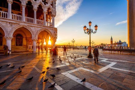 Sunrise view on Piazza San Marco, Doge’s Palace (Palazzo Ducale) in Venice, Italy. Architecture and Venice landmark. Sunrise cityscape of Venice.