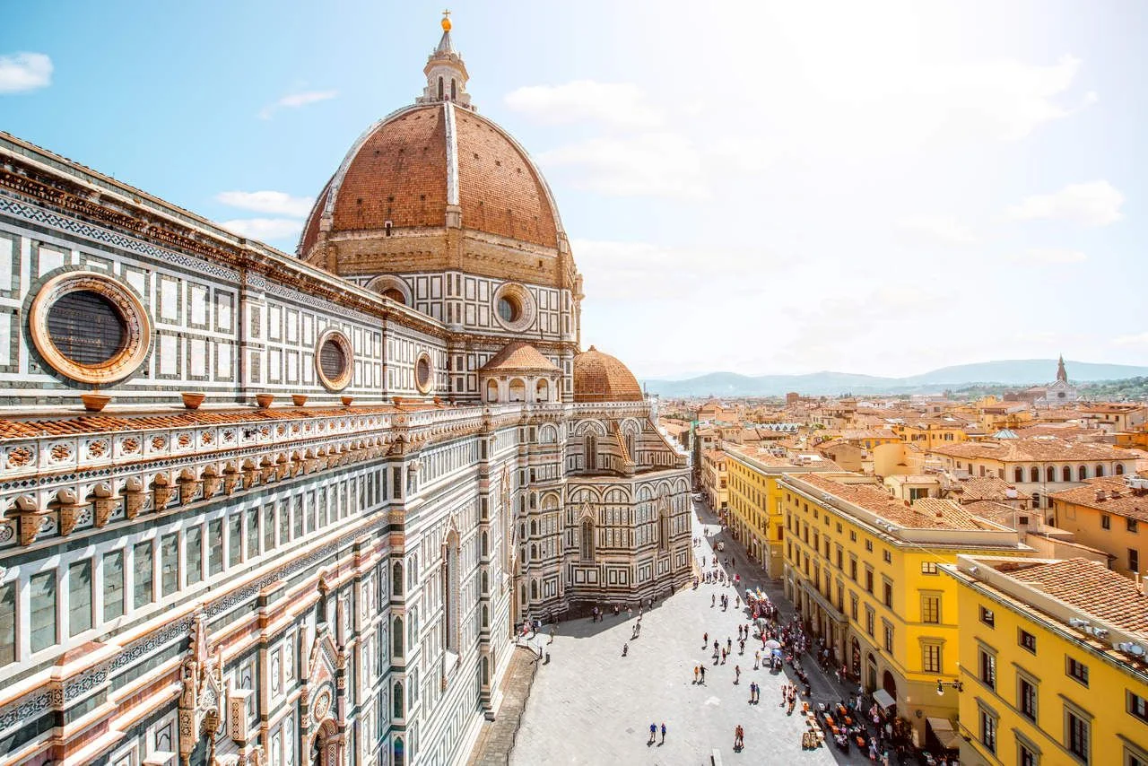 Top view of the dome of the Church of Santa Maria del Fiore and the old town of Florence
