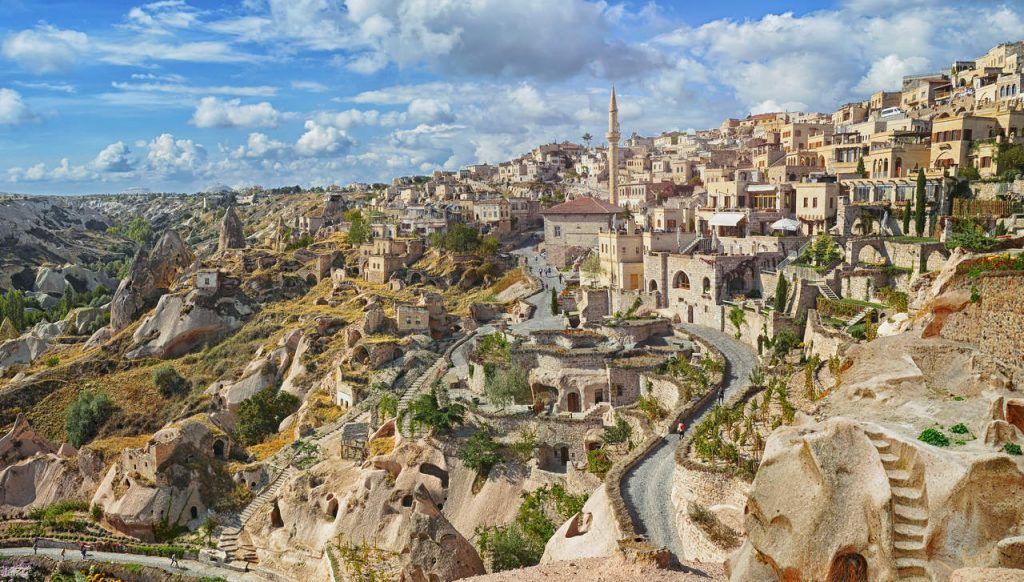 View of ancient Nevsehir cave town and a castle of Uchisar dug from a mountains in Cappadocia, Central Anatolia,Turkey