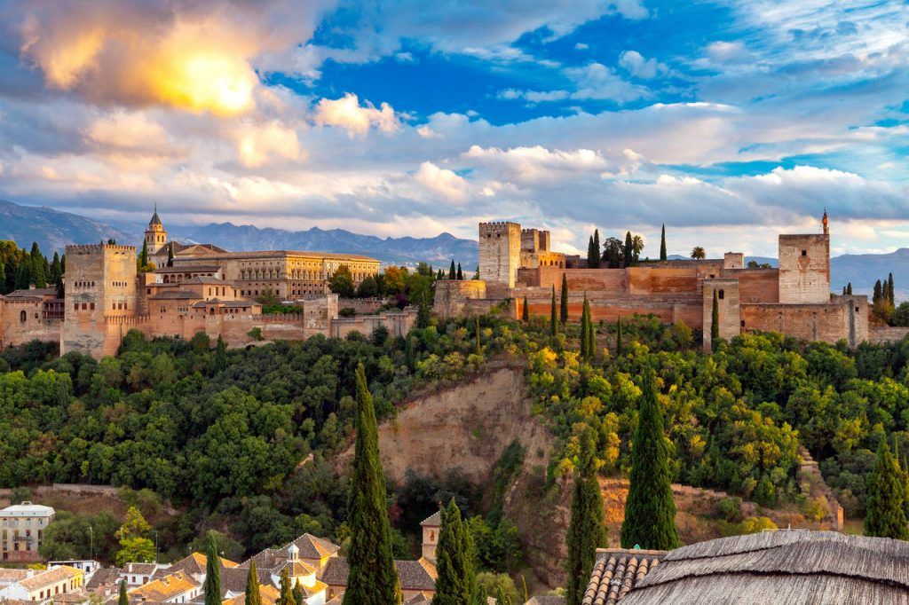 Walls and towers of the fortress of the Alhambra at sunset in Granada. Andalusia. Spain.