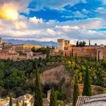 Walls and towers of the fortress of the Alhambra at sunset in Granada. Andalusia. Spain.