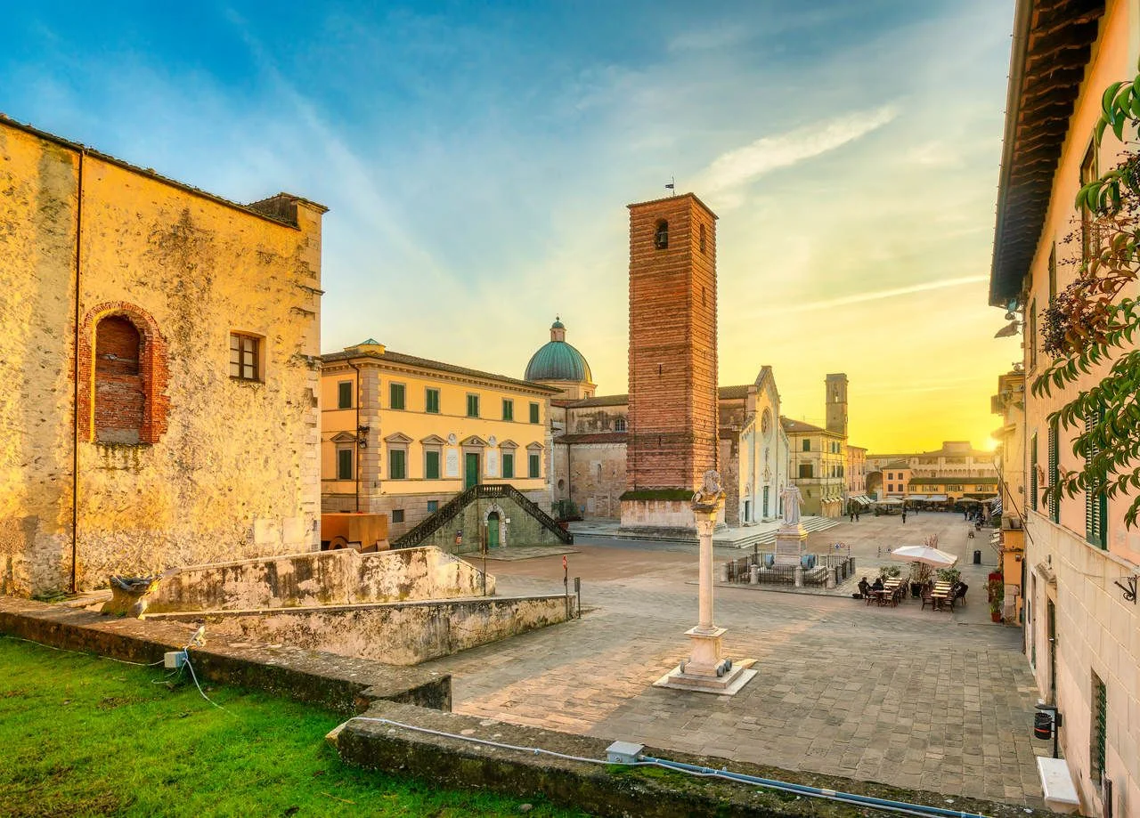 Pietrasanta old town view at sunset, San Martino cathedral and torre civica. Versilia Lucca Tuscany Italy Europe