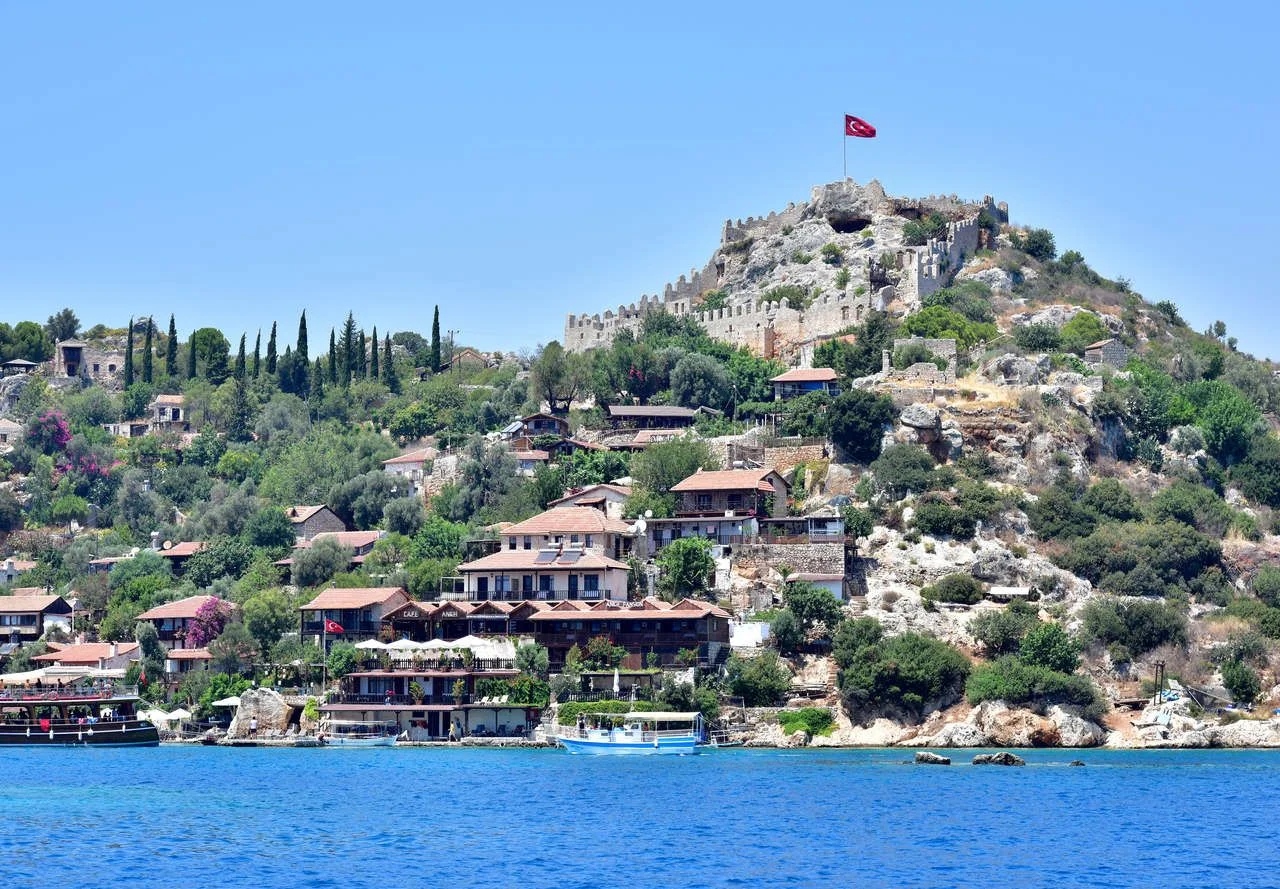 View of Simena Castle, Kaleköy and Kekova with a turquoise sea in a summer time. Simena Kekova Demre Antalya; August 2020