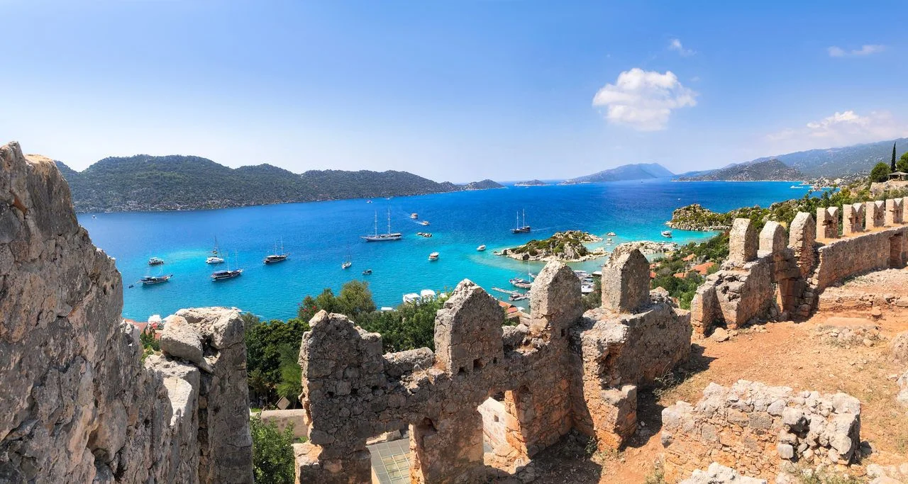 View of Simena Castle, Kaleköy, and Kekova with a turquoise sea in the summertime.Simena Kekova Demre Antalya