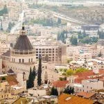 Basilica of Annunciation among other buildings in Nazareth, Israel