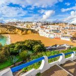 Beautiful beach, cliffs and stairs in colorful Carvoeiro, Algarve, Portugal