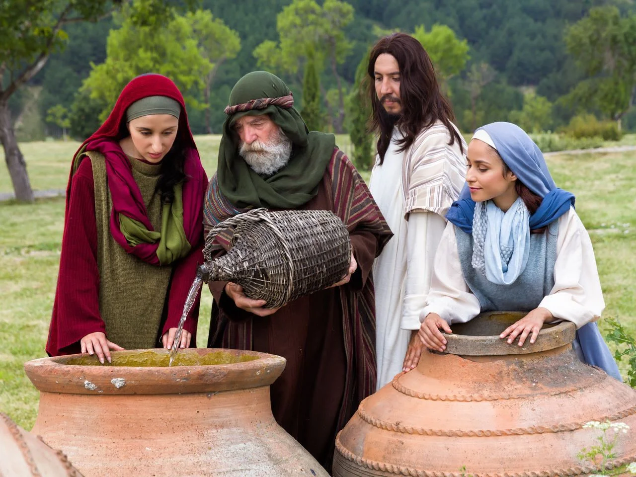 Biblical scene play of the miracle of transformation of water into wine in Cana of Galilee