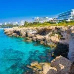 Cyprus. Ayia Napa Resort. Hotels off the coast. Blue Loguna in Cyprus. Rocky seashore. Relax in a resort hotel. Travels in Cyprus. Mediterranean Sea. Cavo Greco. Ayia Napa Resort Panorama