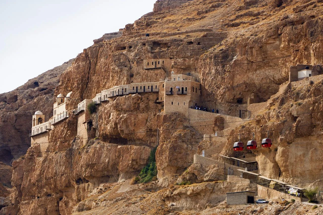The monastery of the Mount of Temptation and the connecting cable cars in Jericho, the oldest town in the earth