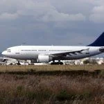 View of a commercial plane landing on a airport