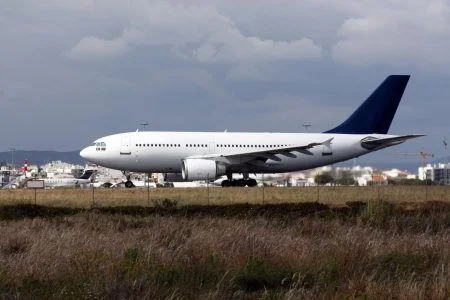 View of a commercial plane landing on a airport