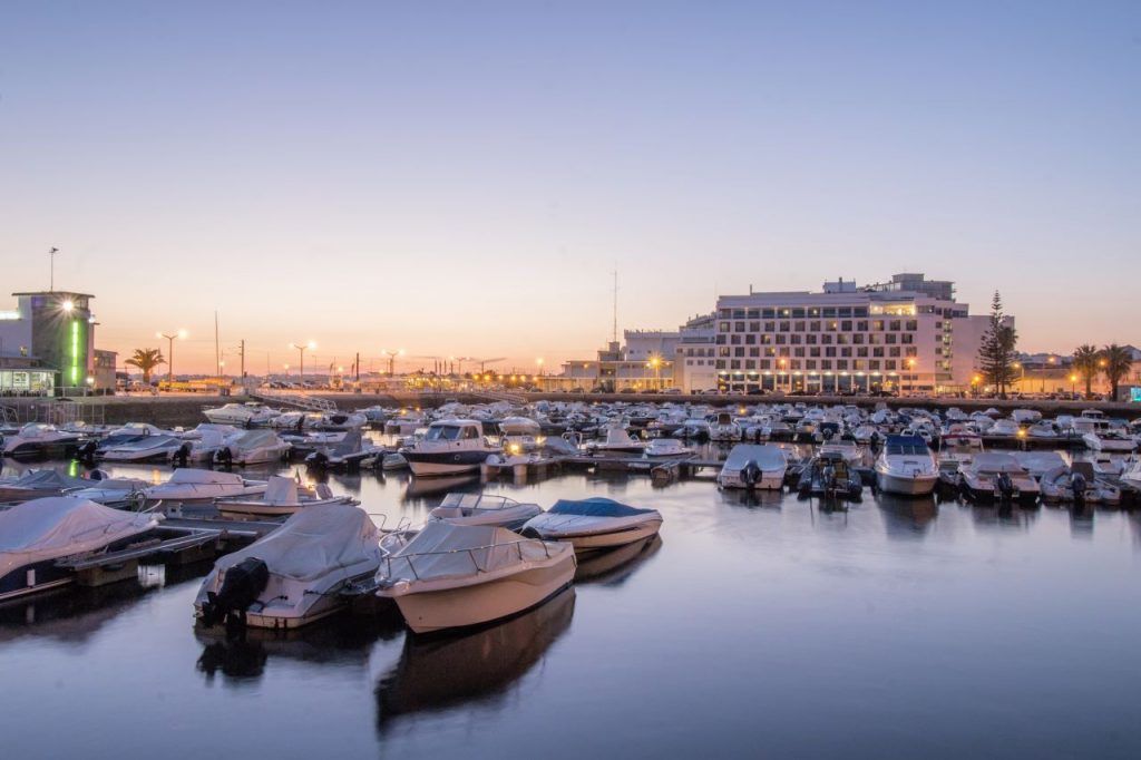 View of the peaceful marina of Faro city, Portugal at dawn