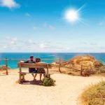mature couple looking at the ocean
