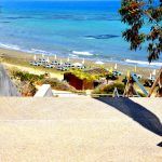 path with stairs going down to Faros beach, Pervolia, Cyprus