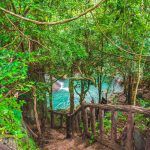 Beautiful blue sky high peak mountains mist fog green forest guiding backpacker backpacking camping campfire relaxing hiking idea long weekend Erawan wa