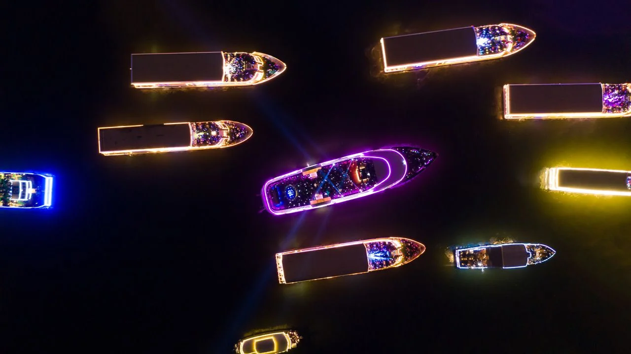 Motion blur aerial view cruise ship at night in Chao Phraya River, Passenger cruise ship vessel, bangkok, Thailand