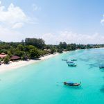 Panoramic view of Pattaya beach over crystal clear tropical water on the paradise island of Ko Lipe, Thailand