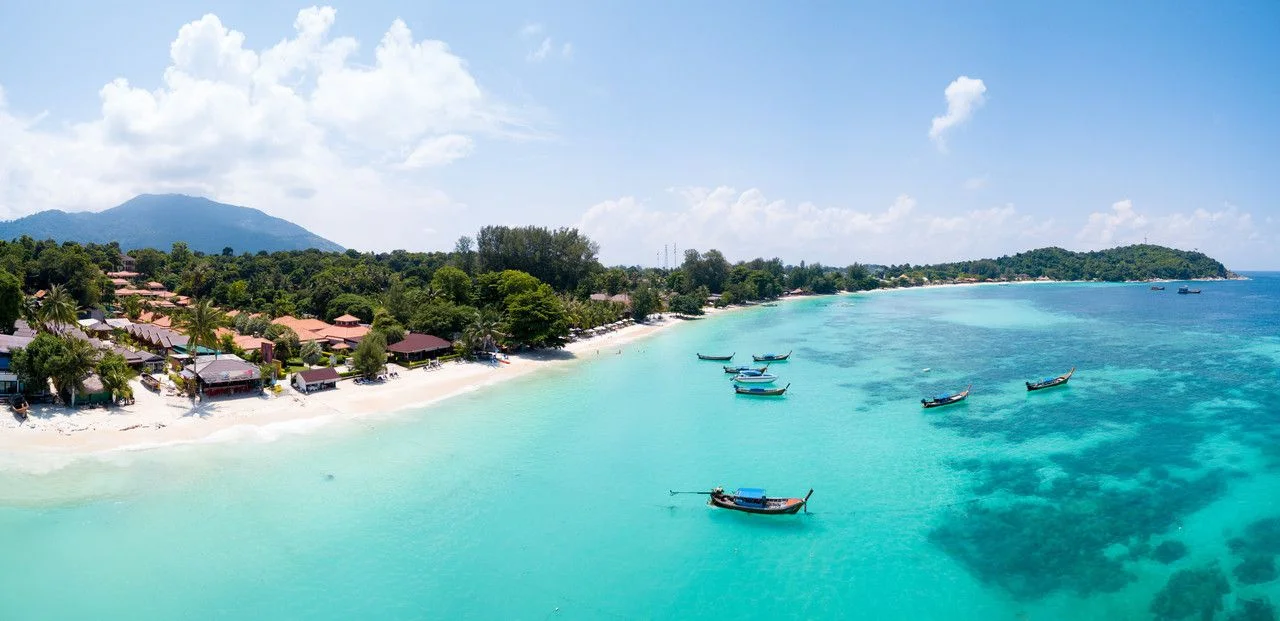 Panoramic view of Pattaya beach over crystal clear tropical water on the paradise island of Ko Lipe, Thailand
